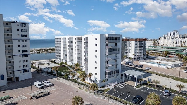 view of building exterior with a water view