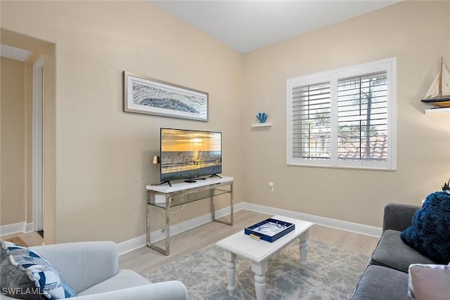 living room with light hardwood / wood-style flooring