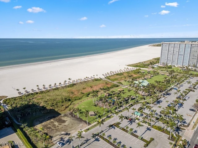 bird's eye view with a beach view and a water view