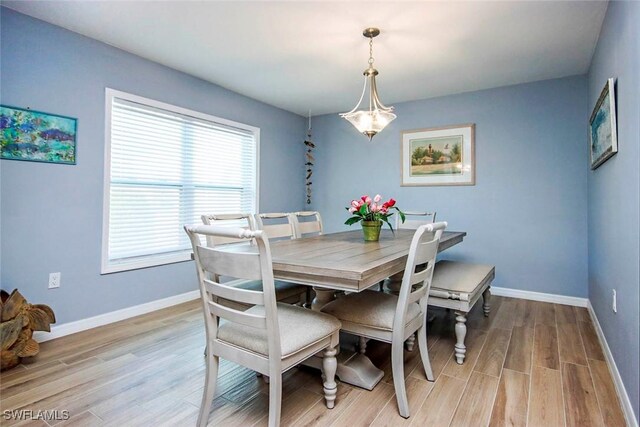 dining space featuring light hardwood / wood-style flooring