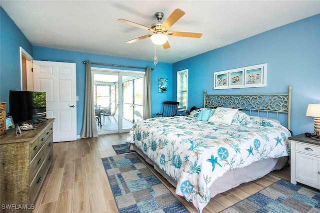 bedroom featuring ceiling fan, light hardwood / wood-style floors, and access to outside