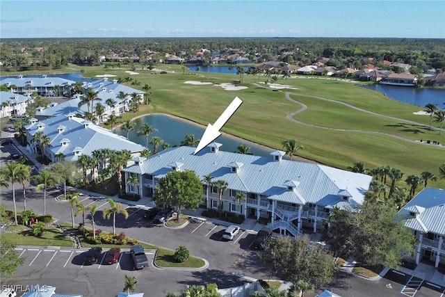 bird's eye view with a water view