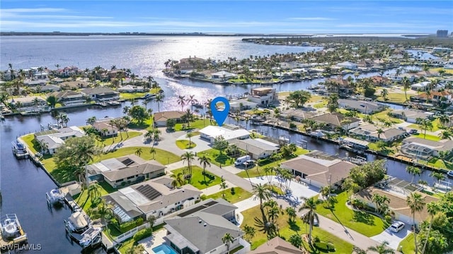 drone / aerial view featuring a water view