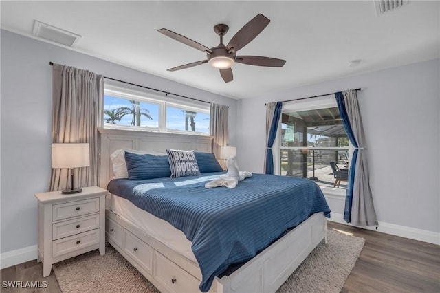 bedroom featuring ceiling fan and hardwood / wood-style flooring