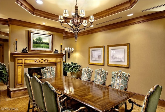 dining space featuring light colored carpet, a raised ceiling, ornamental molding, and a notable chandelier