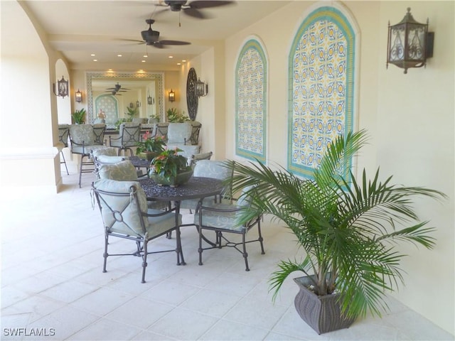 dining space with ceiling fan