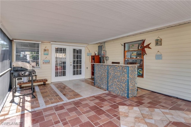 view of patio / terrace with a grill and french doors