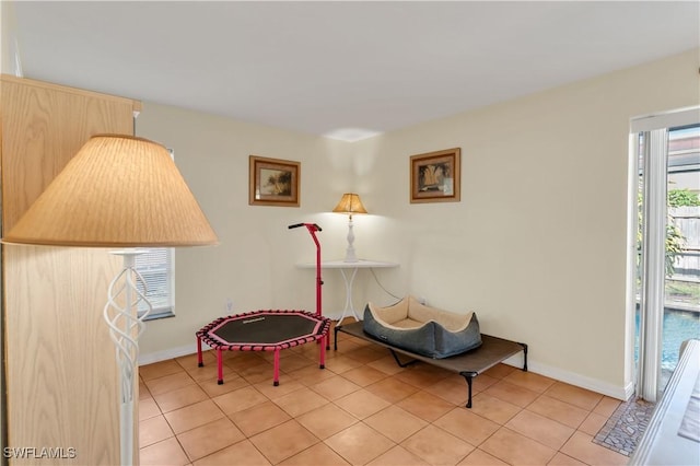 sitting room with light tile patterned floors