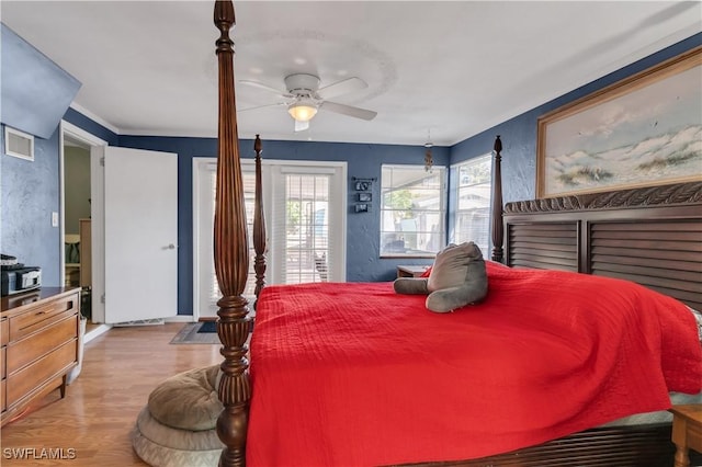 bedroom featuring light wood-type flooring and ceiling fan