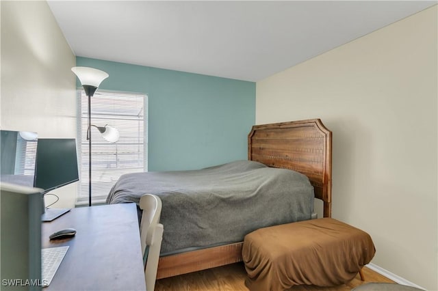 bedroom featuring wood-type flooring