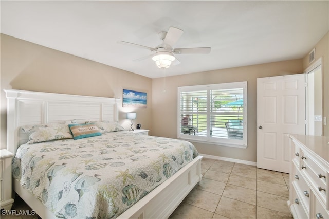 bedroom featuring ceiling fan and light tile patterned flooring