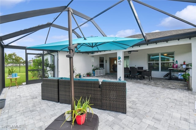 view of patio with a lanai