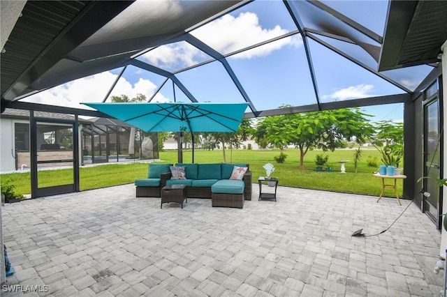 view of patio / terrace with an outdoor living space and a lanai