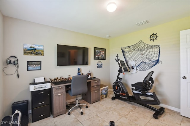 office with light tile patterned floors