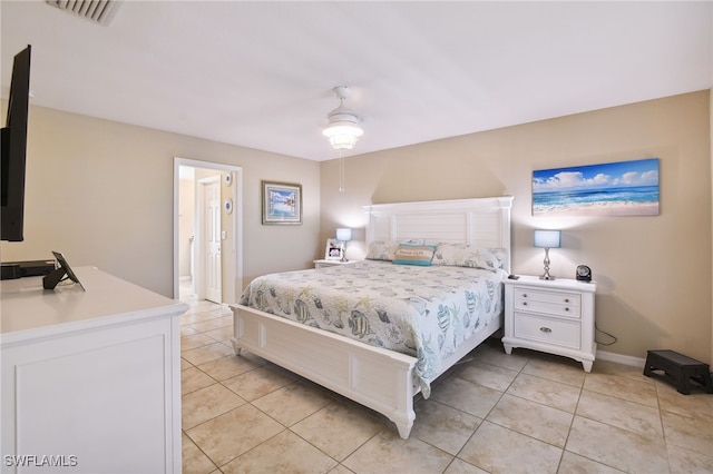 bedroom featuring ceiling fan and light tile patterned floors