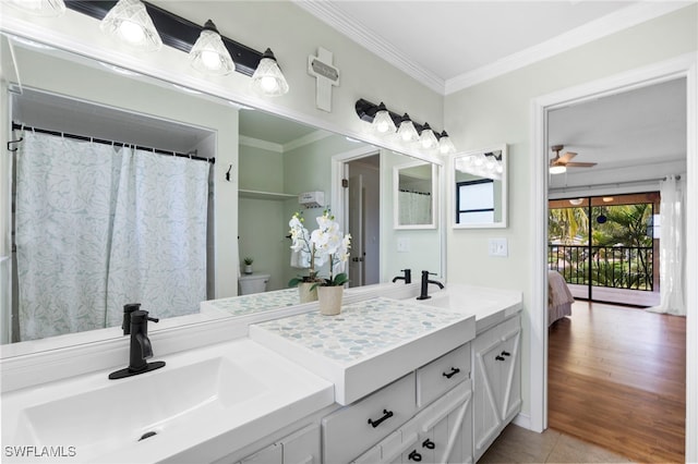 bathroom with ceiling fan, hardwood / wood-style floors, crown molding, and toilet