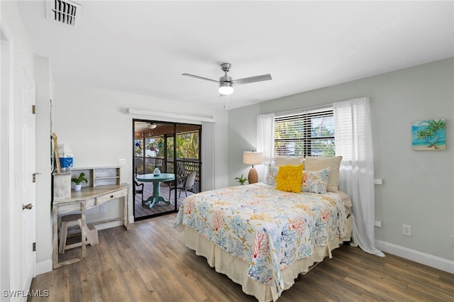 bedroom featuring multiple windows, ceiling fan, dark hardwood / wood-style flooring, and access to exterior