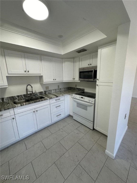 kitchen with white electric range oven, white cabinetry, crown molding, and sink