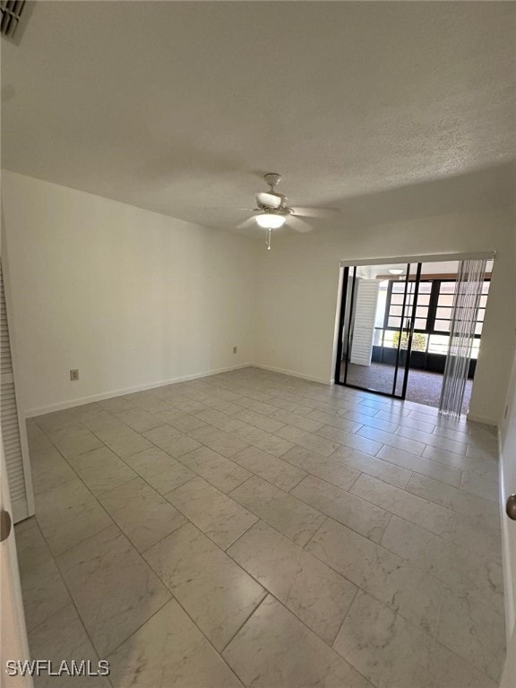 empty room with ceiling fan