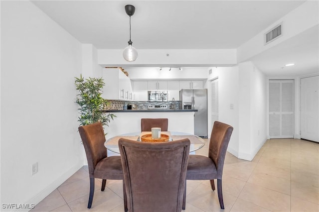 view of tiled dining area