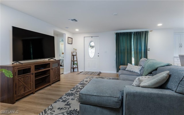 living room featuring light hardwood / wood-style floors