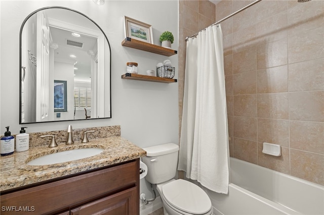 full bathroom with shower / bath combination with curtain, vanity, and toilet