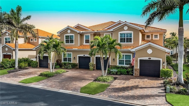 view of front of property with a garage