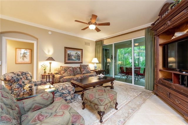 living room with light tile patterned floors, ceiling fan, and crown molding