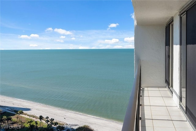 view of water feature with a beach view