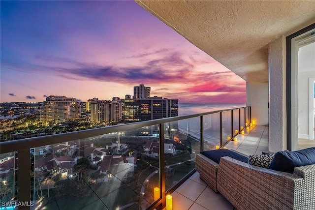 view of balcony at dusk