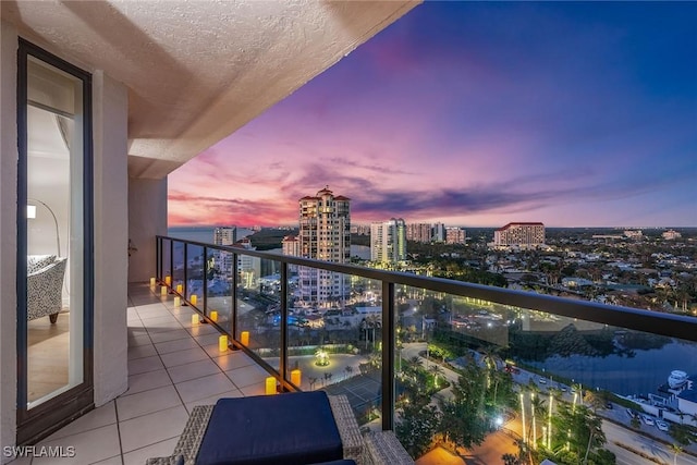 view of balcony at dusk