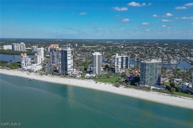 aerial view featuring a water view and a view of the beach