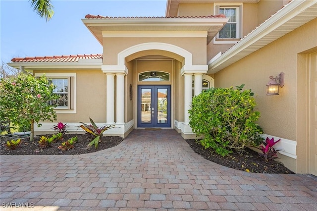 doorway to property featuring french doors