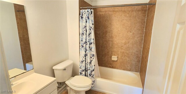 full bathroom with toilet, vanity, and shower / tub combo with curtain