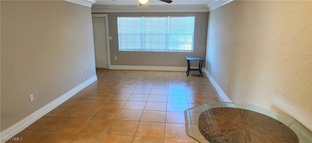 unfurnished room featuring light tile patterned floors, crown molding, and ceiling fan