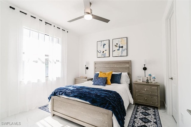 bedroom featuring ceiling fan