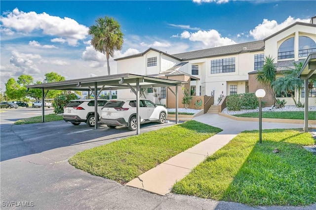 view of parking with a carport