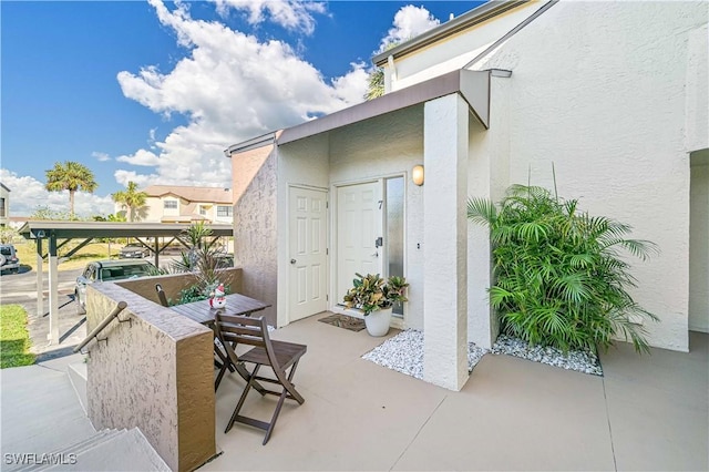 view of patio / terrace featuring an outdoor bar