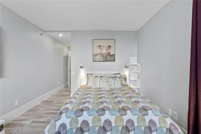 bedroom featuring light hardwood / wood-style flooring