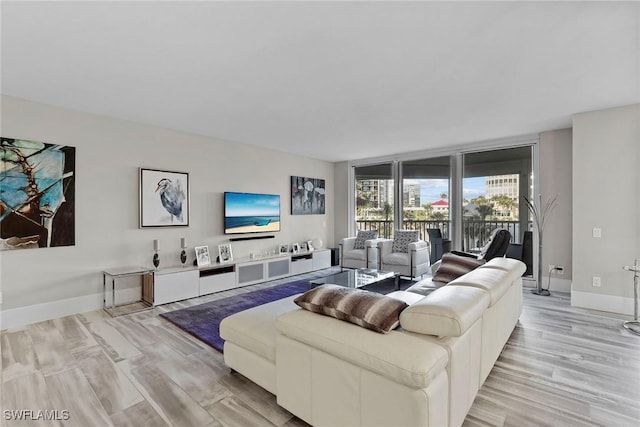 living room with light hardwood / wood-style floors