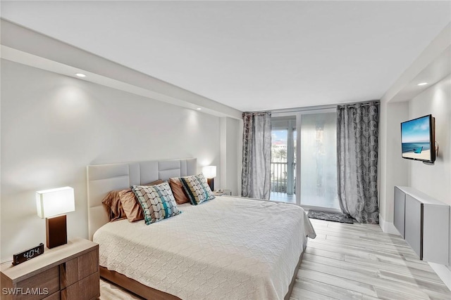 bedroom with light hardwood / wood-style flooring