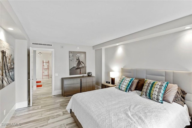 bedroom featuring light wood-type flooring