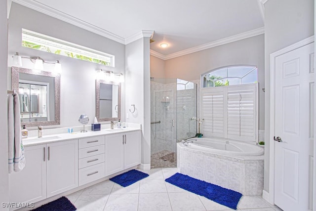 bathroom featuring tile patterned flooring, vanity, ornamental molding, and shower with separate bathtub