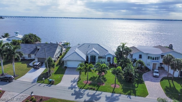 drone / aerial view with a water view