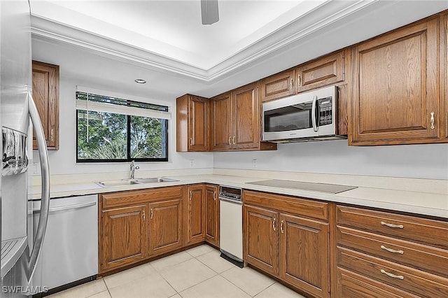 kitchen with ceiling fan, sink, light tile patterned floors, and appliances with stainless steel finishes