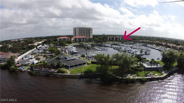 birds eye view of property featuring a water view