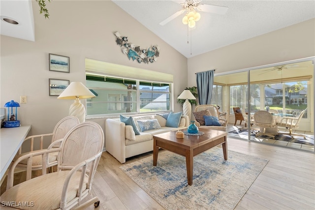 304 Mcgregor Park Cir Unit 304, Fort Myers, FL 33908 - living area featuring ceiling fan, high vaulted ceiling, and light wood finished floors