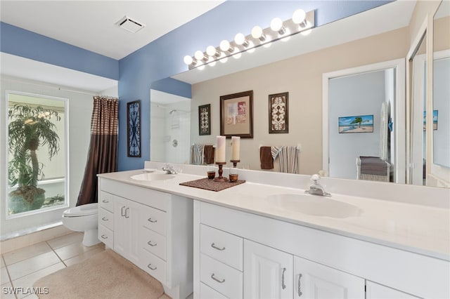 304 Mcgregor Park Cir Unit 304, Fort Myers, FL 33908 - bathroom featuring double vanity, a shower with curtain, and tile patterned floors
