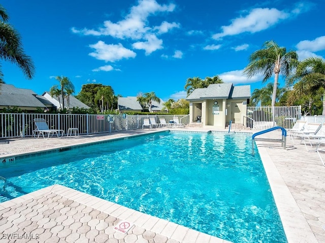 view of swimming pool with a patio