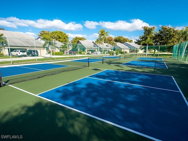 view of sport court featuring basketball hoop